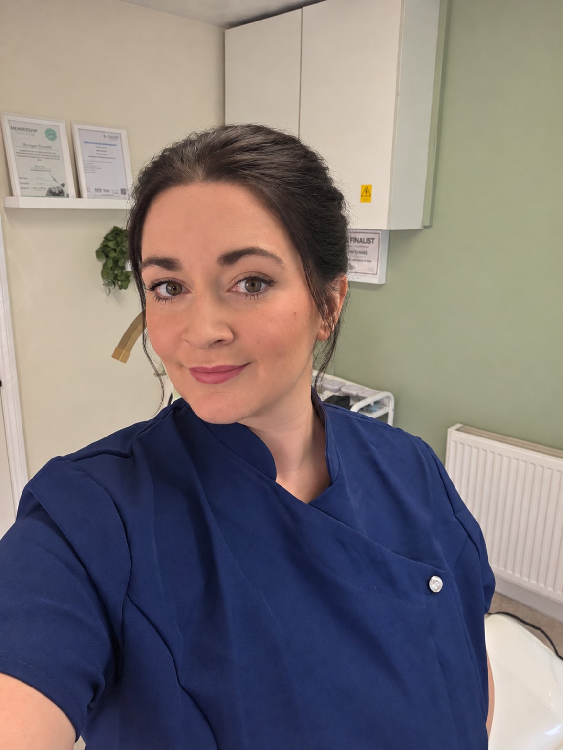 Jane Hatch, founder of First Point Ear Care, in her navy clinical uniform